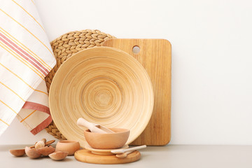 Wall Mural - set of dishes made of wood on the table.