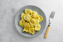 Top View Of Cooked Tortellini On A Plate, Isolated Pasta Dish.