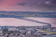 Tay Railway Bridge from Dundee Law Dundee Scotland at Sunset as the sun goes down over the city.