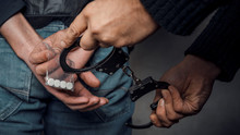 Police Officer And Man Arrested For Drug Possession