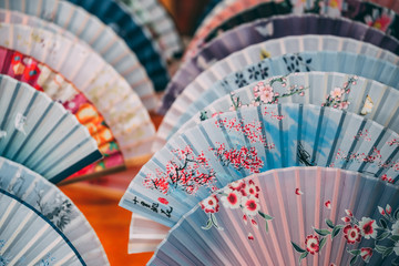 Colourful souvenir fans for sale