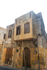 The Jewish quarter in the old town of Rhodes.  A Greek island with the oldest, still lived in, medieval city in Europe.  A balconied old Turkish house in the Jewish quarter.