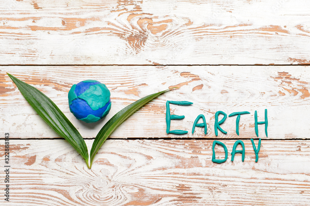 Composition for Earth Day on wooden background