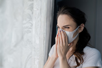 Wall Mural - woman afraid of catching a cold, adult wearing dust mask, pm 2.5 dust