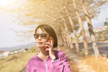 Sticker - Asian woman talk on cellphone