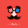 1 April Fools Day. Funny Crazy Mask Glasses. Black mustache and eyebrow, surface nose in paper cut style on red.