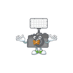 Sticker - mascot cartoon character design of photo camera with lighting making a silent gesture