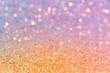 Abstract photo background with sparkling sequins, orange-blue color gradient texture