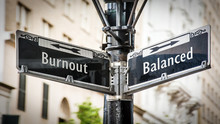 Street Sign To Balanced Versus Burnout