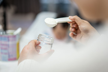 prepairing milk formula for feeding baby