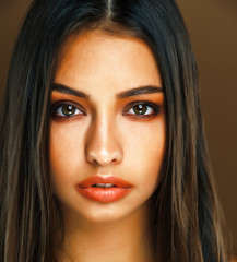 Wall Mural - cute happy young indian woman in studio closeup smiling, fashion beauty