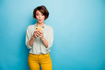 photo of attractive lady hold telephone hands read new blog post comments not believe eyes speechles