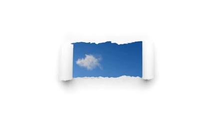 Wall Mural - Creative 4k time laps video of fast moving clouds in the blue sky that are visible through a hole with torn edges in white paper. The concept of opportunities, a happy future.