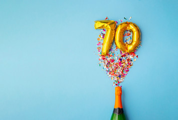 Wall Mural - 70th anniversary champagne bottle balloon pop