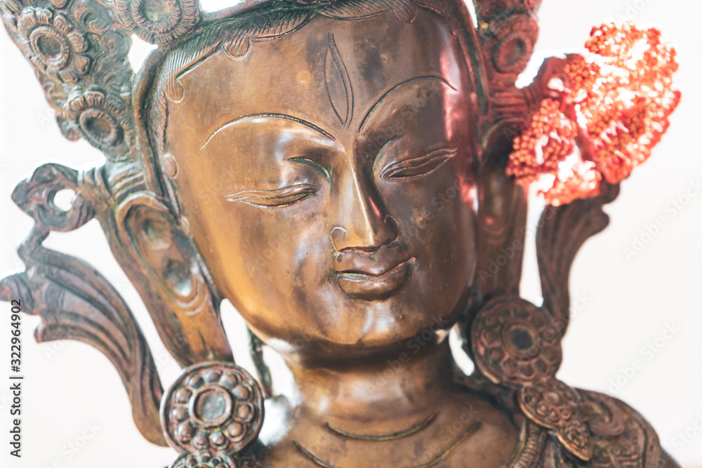 Green Tara. Buddha statue. Buddhism symbol of religion, peace and spirituality. - obrazy, fototapety, plakaty 