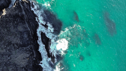  Waves crashing against rocks
