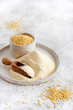 Hulled millet flour and grain