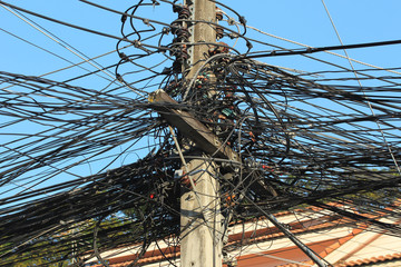 Close-up of Power Cord and Communication Cable Clutter in Chiang mai, Thailand.