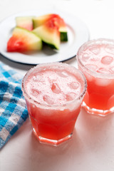 Mexican watermelon margarita cocktail on white background