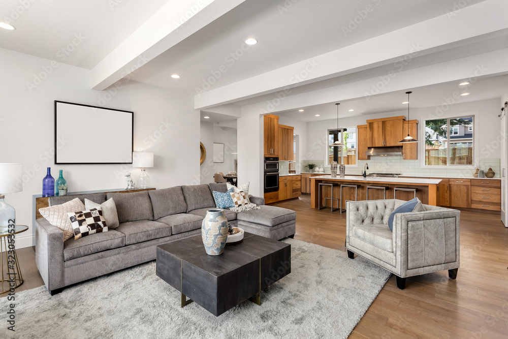 Living room and kitchen interior in new home with open concept floor ...