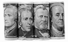 Three Presidents And Ben Franklin On US Banknotes Paper Money, Side By Side, Federal Reserve Notes, Rolled To Show Only Portraits, Hamilton, Jackson, Grant