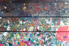 Artists Workshop Or Studio Bench Covered With Splattered Paint Built Up In Authentic Texture On Painted Surface