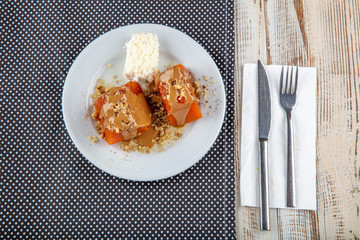 Traditional Turkish Dessert Pumpkin with Syrup and Walnuts, on wooden background (TR: Geleneksel Turk Kabak Tatlisi).