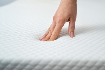 Hand Testing Mattress