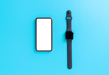 Poster - smartphone and smart watch on light blue background