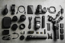 Flat Lay Composition With Camera And Video Production Equipment On Light Grey Stone Background
