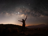 Fototapeta Kosmos - The stars and the milky way in the night sky are very beautiful.