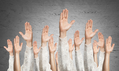 Wall Mural - Row of man hands showing voting gesture