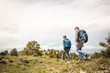 © MACO - Father and son hiking in rural prairie landscape. Cody, Wyoming, USA