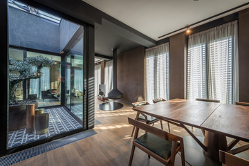 Interior of a luxury open plan apartment with fireplace