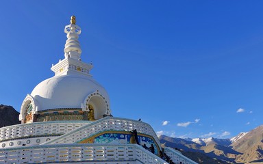 Wall Mural - A Ladakhi stupa a mound-like or hemispherical structure containing relics typically the remains of Buddhist monks or nuns that is used as a place of meditation  2020