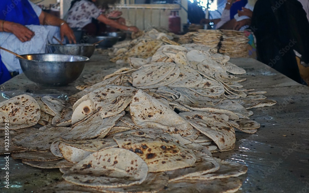 Roti making in the Langar at Golden Temple a Sikh community kitchen in ...