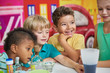 © DenisProduction.com - Happy smiling kids at playroom. Joyful kids on Birthday party show. Childrens activity center.