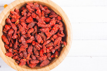 Canvas Print - dried goji, cherry, raisin and plum fruits on white wood