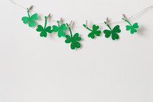 St. Patricks Day Background With Homemade Glitter Shamrocks Garland