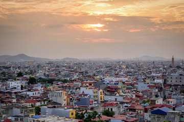 Awakening fast changing city, northern Vietnam, a developing city and country, fusion of local tradition and modern buildings