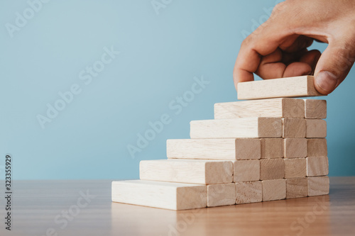 Fotomural Business concept of ladder career path and growth success process