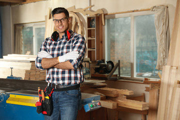 Sticker - Professional carpenter with set of tools in workshop