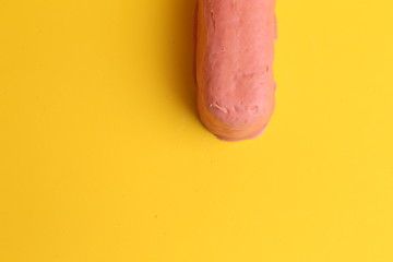 delicious pink chocolate cake in color background