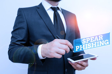 Poster - Text sign showing Spear Phishing. Business photo text Sending fake emails to extract financial data from user Male human wear formal work suit hold smart hi tech smartphone use one hand