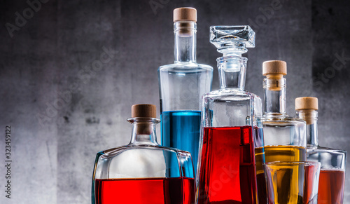Cuadros en Lienzo Carafe and bottles of assorted alcoholic beverages.