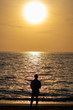 © Ivaylo - silhouette of a man at sunset