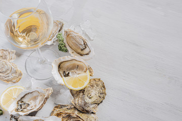 Fresh oysters with lemon ice and white wine.