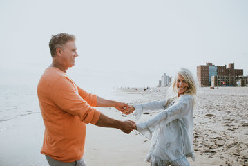 happy senior couple spending time at the beach. Concepts about love,seniority and people