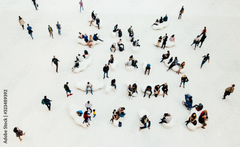 Blurred concept with a mass of people doing things. view from above - obrazy, fototapety, plakaty 