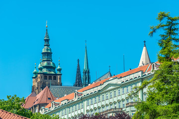 View of the top of old buildings with red roof and blue sky at Prague city Czech republic.